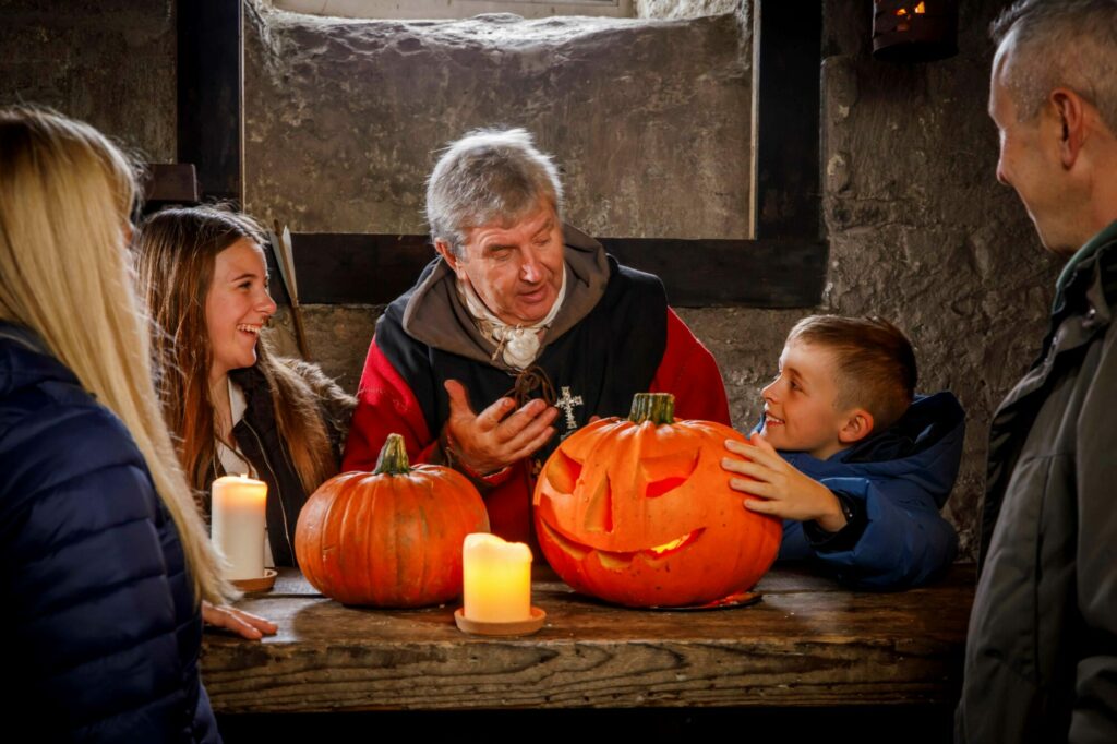 Halloween Events at Bolton Castle in 2024: Spooky Family Fun in a Historic Setting Post image 4 Image name Children with Pumpkin at Bolton Castle 3 the 4 image from the post Halloween Events at Bolton Castle in 2024: Spooky Family Fun in a Historic Setting in Yorkshire.com.