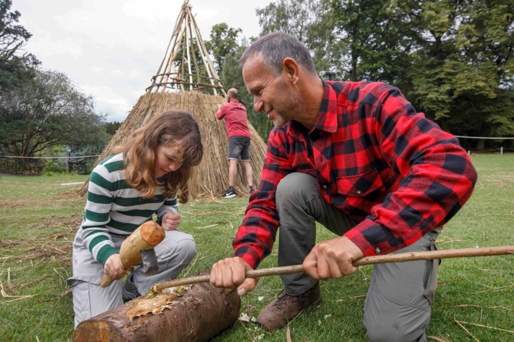 Britain's Ancient Past: Reconstructing a Mesolithic House at the Yorkshire Museum Post image 7 Image name Eleanor Grahame Clarke learns skills from specialist builder Leo Wolterbeek with Deiderik Pomstra in the background 18 the 7 image from the post Britain's Ancient Past: Reconstructing a Mesolithic House at the Yorkshire Museum in Yorkshire.com.