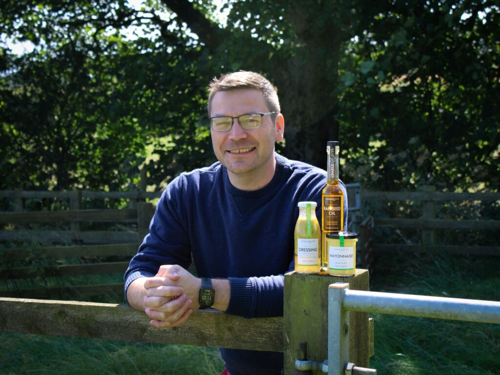 Award-Winning British Rapeseed Oil: Charlie & Ivy's Triumph at the Great Taste Awards Post image 1 Image name Jason Thompson with the Great Taste award winning products from Charlie Ivys the 1 image from the post Award-Winning British Rapeseed Oil: Charlie & Ivy's Triumph at the Great Taste Awards in Yorkshire.com.
