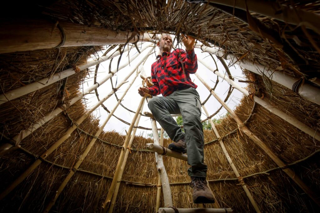 Britain's Ancient Past: Reconstructing a Mesolithic House at the Yorkshire Museum Post image 4 Image name Leo Wolterbeek specialist builder within the Mesolithic build 17 the 4 image from the post Britain's Ancient Past: Reconstructing a Mesolithic House at the Yorkshire Museum in Yorkshire.com.