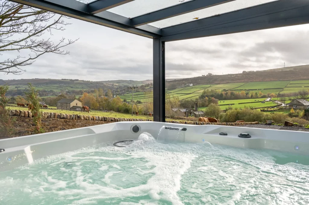 Image name hot tub in haworth the lee the 3 image from the post Special offer: £55 off all bookings at Luxury Cottages in Yorkshire.com.