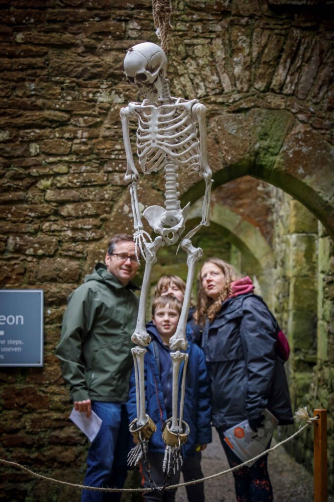 Image name Family with Skeleton at Bolton Castle 5 the 4 image from the post Halloween at Bolton Castle 2024: A Spooky Family Adventure in Yorkshire.com.
