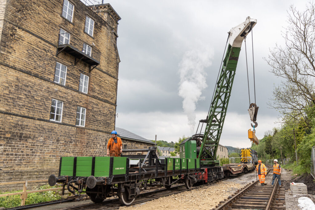 Major Engineering Project Underway at Keighley & Worth Valley Railway: Bridge 27 Replacement Post image 2 Image name Grafton Steam Crane assisting volunteers at Bridge 27 the 2 image from the post Major Engineering Project Underway at Keighley & Worth Valley Railway: Bridge 27 Replacement in Yorkshire.com.