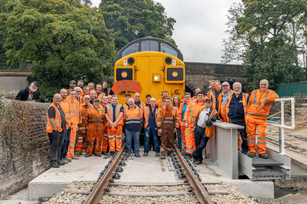 Keighley & Worth Valley Railway Completes £1.25 Million Bridge Replacement Project Post image 1 Image name KWVR Bridge 27 Volunteers on opening day the 1 image from the post Keighley & Worth Valley Railway Completes £1.25 Million Bridge Replacement Project in Yorkshire.com.