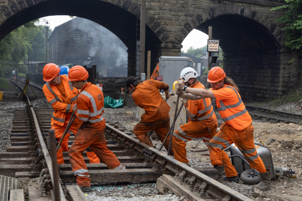Major Engineering Project Underway at Keighley & Worth Valley Railway: Bridge 27 Replacement Post image 1 Image name Volunteers at Bridge 27 relaying track on Phase 1 the 1 image from the post Major Engineering Project Underway at Keighley & Worth Valley Railway: Bridge 27 Replacement in Yorkshire.com.