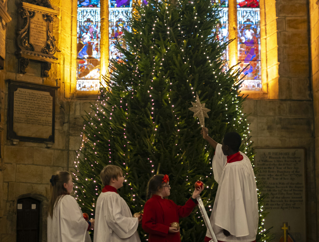Image name bradford cathedral choristers decorating tree featured banner the 29 image from the post Newsletter: Saturday 14th December 2024 in Yorkshire.com.