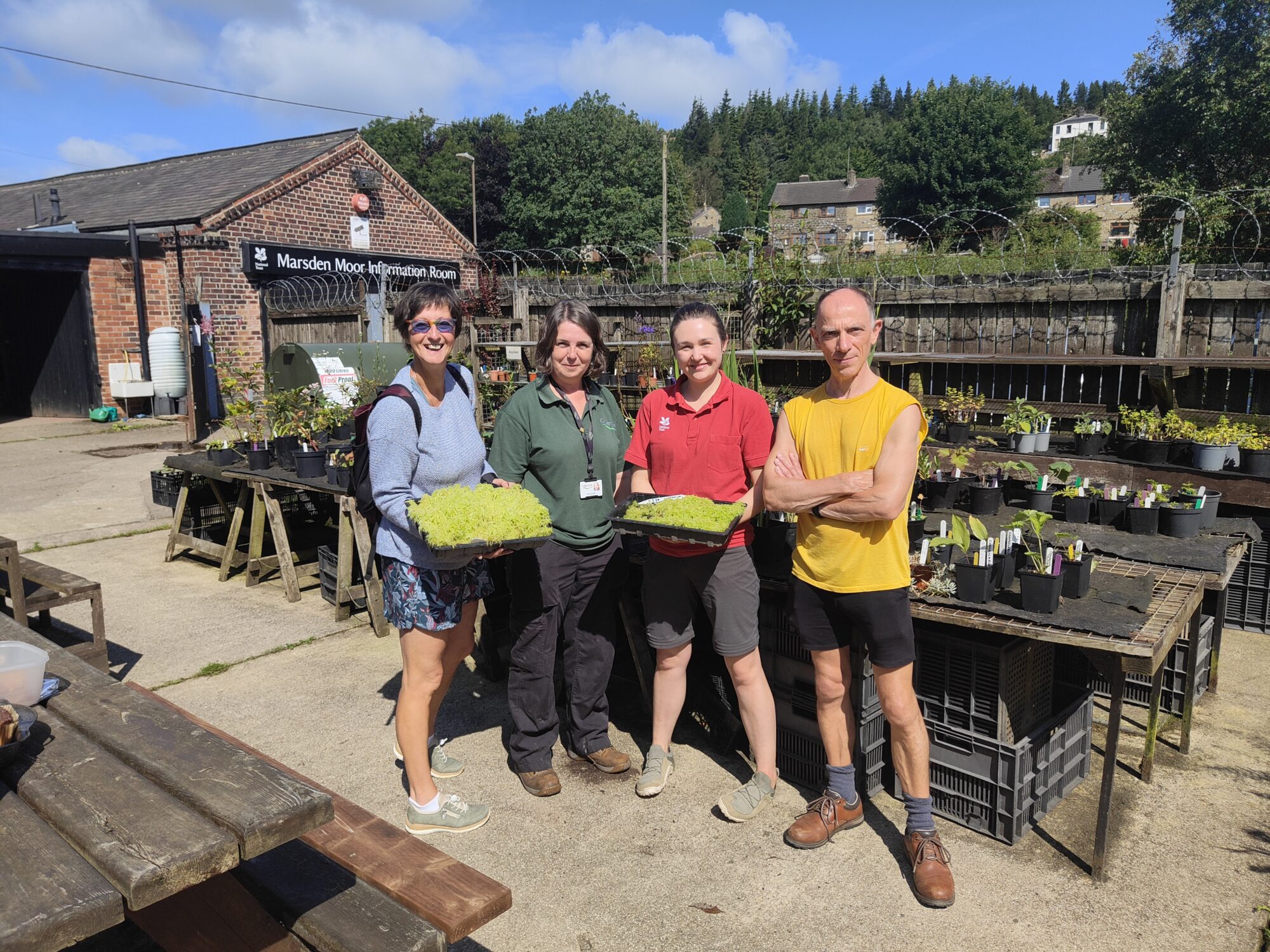 Image name Rangers volunteers and members of the Calderdale Sphagnum Project at the launch of the plant nursery in 2024 the 5 image from the post National Trust to bring the moorland into Marsden with new education centre in 2025 in Yorkshire.com.