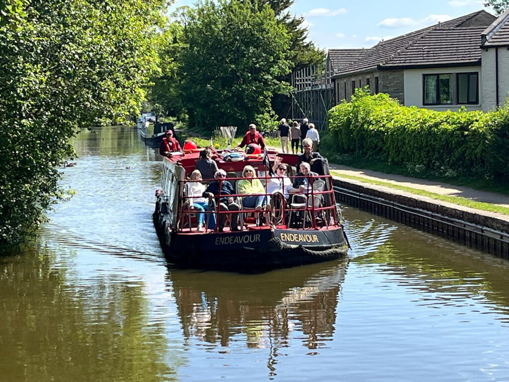York Care Home Residents Set Sail for a Scenic Day in Skipton Post image 1 Image name canal boat skipton the 1 image from the post York Care Home Residents Set Sail for a Scenic Day in Skipton in Yorkshire.com.