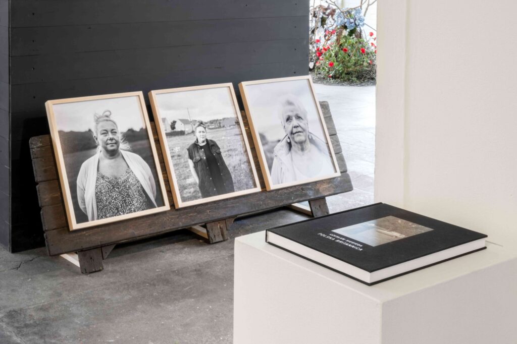 What Is the Many Hands Photography Exhibition About Working-Class Community at Sunny Bank Mills? Post image 2 Image name Artist Joanne Coates three portraits and artist Czeslaw Siegieda book in the Many Hands exhibition at Sunny Bank Mills. Photo by Harry Meadley 1MB the 2 image from the post What Is the Many Hands Photography Exhibition About Working-Class Community at Sunny Bank Mills? in Yorkshire.com.