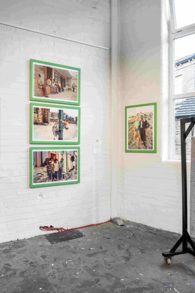 What Is the Many Hands Photography Exhibition About Working-Class Community at Sunny Bank Mills? Post image 3 Image name Artist Victor Weddurburn in the Many Hands exhibition at Sunny Bank Mills. Photo by Harry Meadley 1MB the 3 image from the post What Is the Many Hands Photography Exhibition About Working-Class Community at Sunny Bank Mills? in Yorkshire.com.