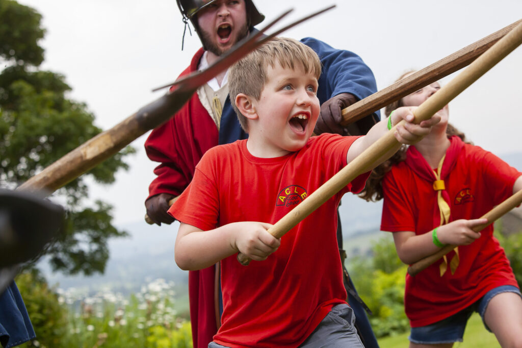 Image name Bolton Castle Children at Event credit Gareth Buddo the 2 image from the post What's On At Bolton Castle? Tudor History, Family Events, And Shakespeare Near Leyburn in Yorkshire.com.