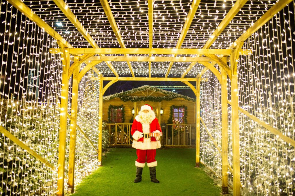 Image name Santa outside his Grotto at Yorkshires Winter Wonderland the 6 image from the post What's On At Yorkshire Winter Wonderland At McArthurGlen Designer Outlet York This Year? in Yorkshire.com.