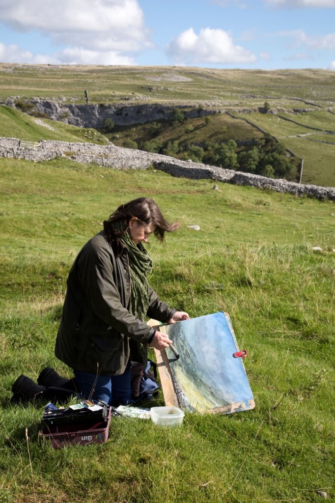 Where to See Art by Three Generations of Women Artists in North Yorkshire? Post image 2 Image name Katharine Holmes painting near Malham Cove the 2 image from the post Where to See Art by Three Generations of Women Artists in North Yorkshire? in Yorkshire.com.
