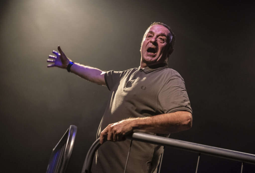 Image name Mark Thomas in Ordinary Decent Criminal 2 © Pamela Raith the 2 image from the post What Is Mark Thomas Doing In The New Play Ordinary Decent Criminal At The Stephen Joseph Theatre? in Yorkshire.com.