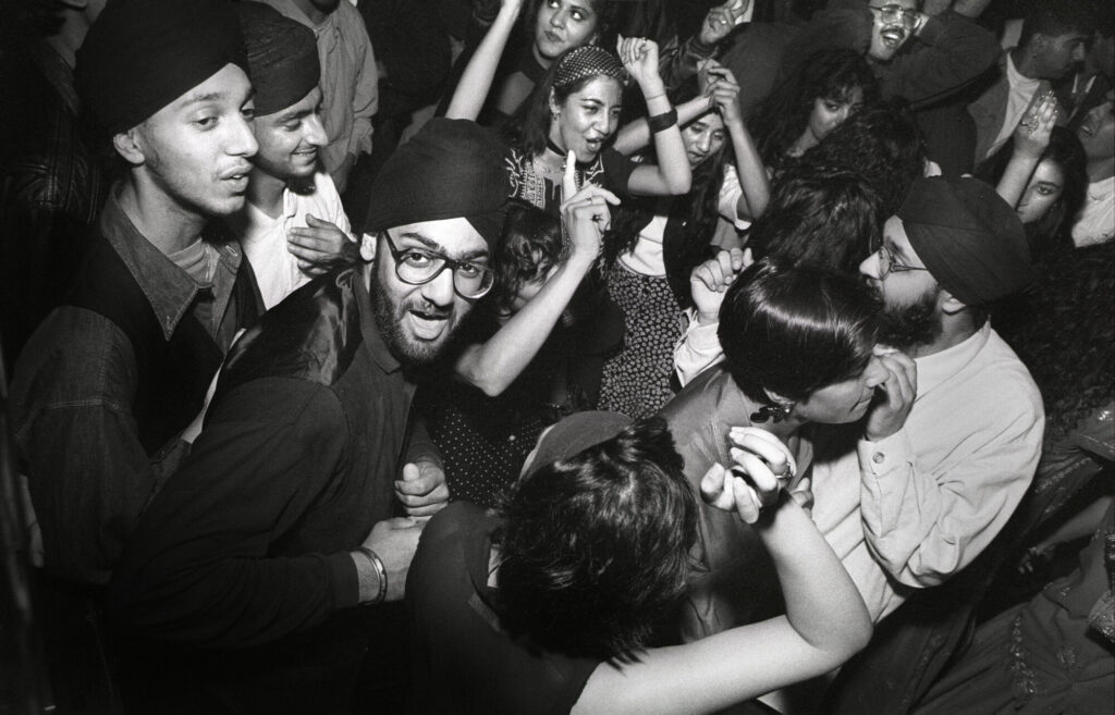 Image name 26404 Young British Asians dancing at Maestro s nightclub in Bradford during the late 1980s. Photo by Tim Smith 1724 5 13a Tim Smith 1 the 2 image from the post Bradford 2025: What Were The Secret Daytimer Parties For South Asian Youth In The 1980s? in Yorkshire.com.