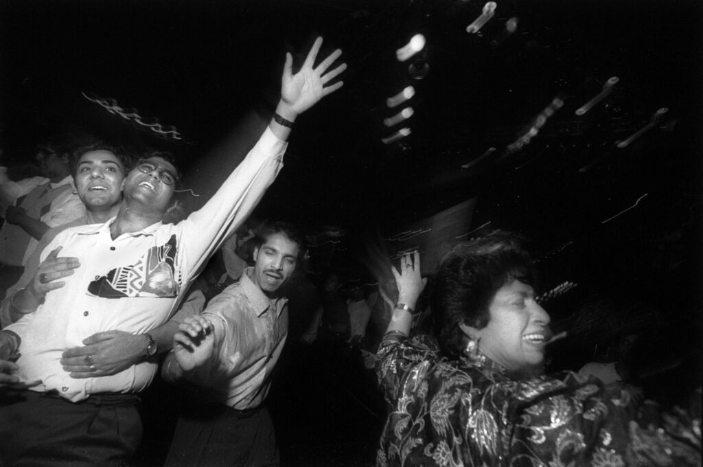 Image name 26408 Dancing at Maestro s nightclub in Manningham circa 1990. By Tim Smith Maestro s 1724 03 14 Tim Smith 1 the 6 image from the post Bradford 2025: What Were The Secret Daytimer Parties For South Asian Youth In The 1980s? in Yorkshire.com.