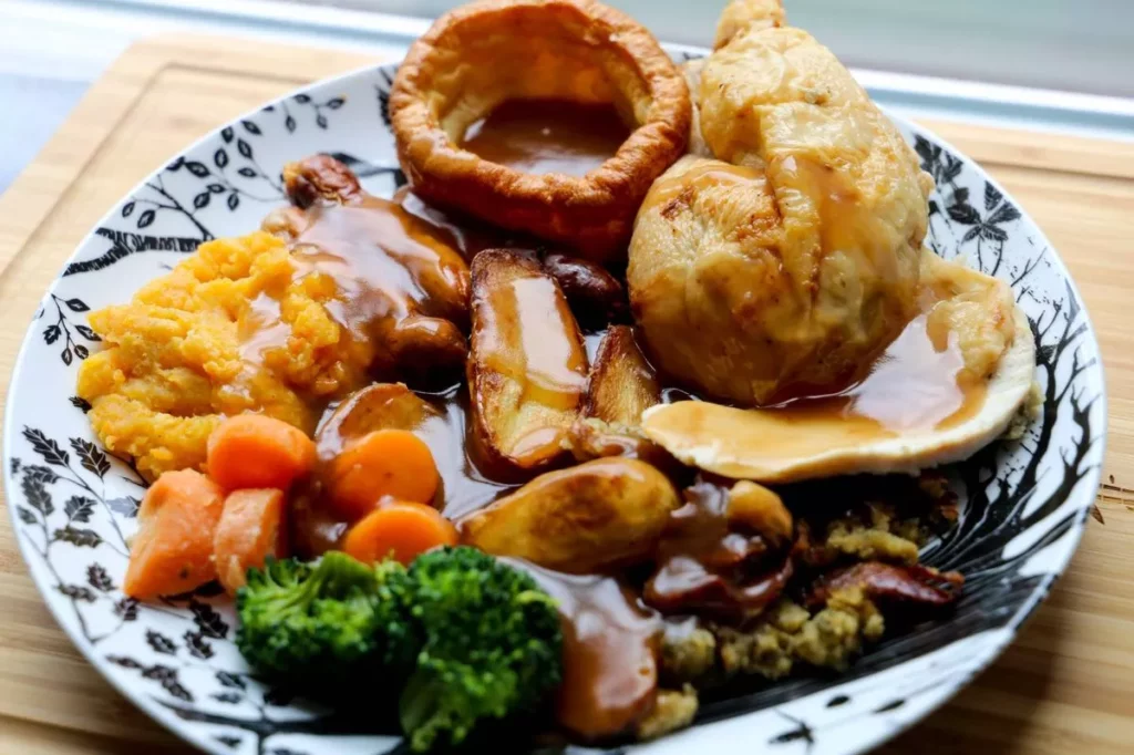 The Most Controversial Christmas Dinner Choices Like Yorkshire Pudding And Curry Sauce For Brits Post image 1 Image name Roast dinner 1 the 1 image from the post The Most Controversial Christmas Dinner Choices Like Yorkshire Pudding And Curry Sauce For Brits in Yorkshire.com.