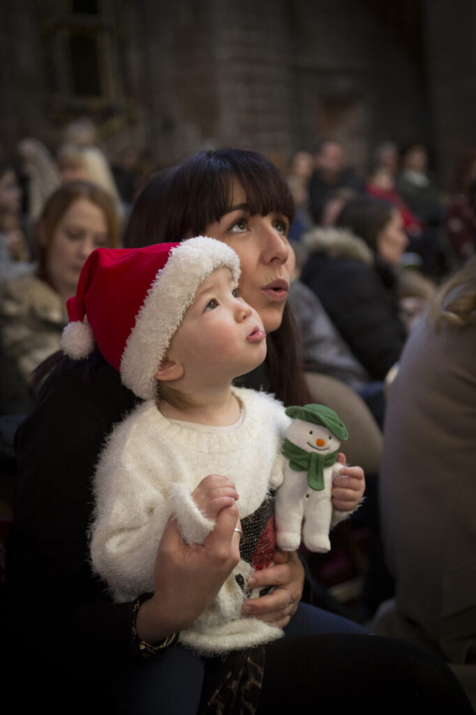 What Is The Snowman With Live Orchestra at Hull City Hall 2025? Post image 2 Image name 4. The Snowman Tour child Mum©️ Tom Bangbala the 2 image from the post What Is The Snowman With Live Orchestra at Hull City Hall 2025? in Yorkshire.com.